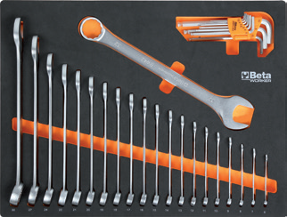 Set of tools including wrenches and sockets on a black background with Beta branding.