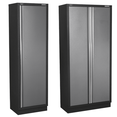 Two black metal cabinets with gray doors on a white background