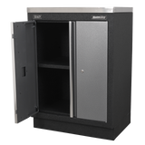 Black storage cabinet with one door open on a white background