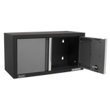 Black storage cabinet with open door on a white background